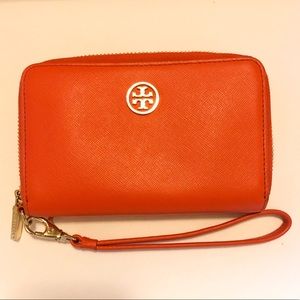 Tory Burch orange wristlet